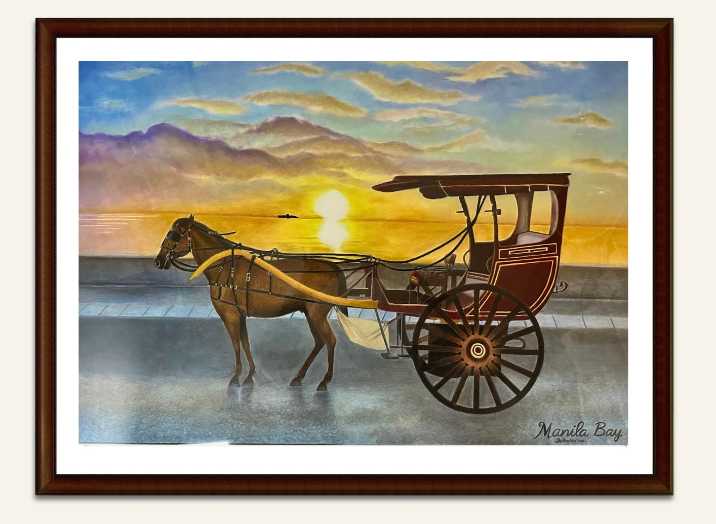 Kalesa at Manila Bay during a glowing sunset